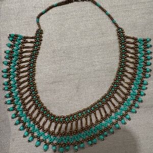Turquoise-colored, beaded statement necklace